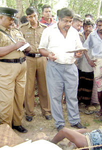 Herath Banda was dragged out of his watch hut and trampled to death.