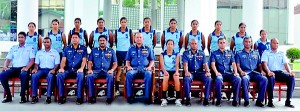 The SLAF women’s volleyball team with officials.