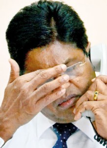 CEB Chairman: Price hike appears to lie heavily on his head.  Pic by Hasitha Kulasekera