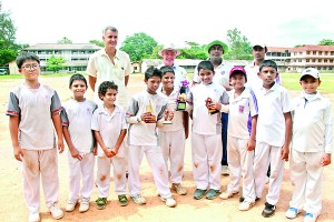 The champion Unicorn team is pictured here with the Principal of The British School John Scarth, Deputy Principal David Goodwin and Head Coach Aruna Batapolarachchi