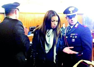 Karima El Mahroug, better known by her stage name ''Ruby the heartstealer'', gestures at Milan's court January 14 (Reuters)