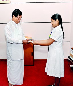 Presenting the Book to the Minister of Education Hon.Bandula Gunawardena