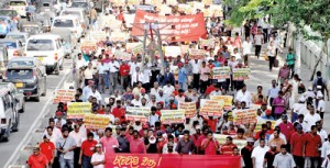 No show: Trade unions take to the streets in Colombo. Pic by Indika Handuwala