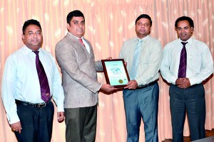 Mr. Ganaka Amarasinghe-President AAT Sri Lanka receives the ISO certification from Mr. Sanjeewa Senevirathna- Country Manager Moody International Ltd.Mr. Lalith Fernando-Vice President AATSL (Right) and Mr. Tishanga Kumarasinghe-CEO AATSL were also present.