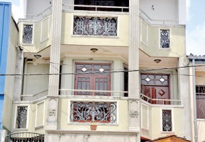Wires strung across balconies of storied buildings at Mattakuliya