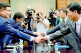 Two Koreas hold rare talks on joint zone