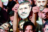 US urges army to free Morsi, supporters defiant