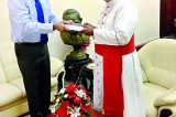 Book presented to Archbishop of Colombo