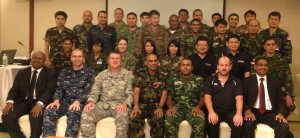 CICRA Director/CEO Boshan Dayaratne and Master Trainer Krishnan Rajagopal with a group of top military officers representing member nations of the Multinational Communications Interoperability Program at the Cyber Endeavor Program in Thailand.