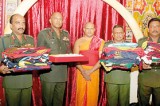 Army’s 37 regimental flags blessed inside  Sri Dalada Maligawa’s inner shrine room