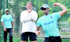 Marvan Atapattu and one of the foreign coaches who presided over Lankan cricket - Geoff March - watching the Sri Lankan players at nets. - File pic