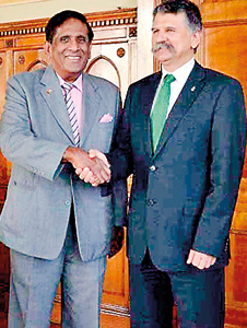 Hungarian Parliament Speaker Laszlo Kover greets Mr. Nanayakkara