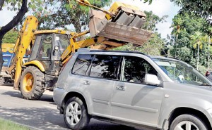 Massive vehicles carelessly parked on busy streets can be seen at every nook and corner.