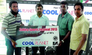 Mohamed Aslam (Left), Accountant of Cool Planet, the Main sponsor handing over the sponsorship cheque to M.R.M. Razak (second from right), Project Chairman of the Sports Festival 2013. Also in the picture from left are Sharan Laffir, President, Group of 90s and M. Shiraz, the Secretary.