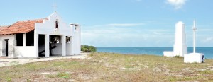 Landmark on an island: The solitary historic Church of St Anthony with the white tower to the right-- the sentinel for fishermen at night