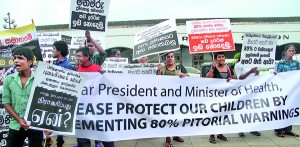 At a recent demonstration in Colombo, protesters calling for big pictorial warnings on packets of cigaretters