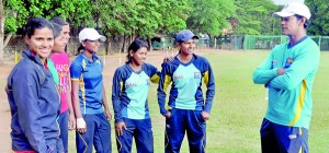 The newly appointed national women’s coach, Jeevantha Kulatunga, having a formal chat with his players after a practice session. - Pic by Ranjith Perera