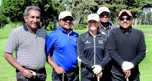 Standing left to right in the picture are Ranjan de Costa, Kirupa Ariathurai, Annika Sorenstam, Howard Perera and Sugu Ariathurai, Captain of the California Sri Lankan golf team. This golf foursome was the winner of the tournament and was presented with Championship awards