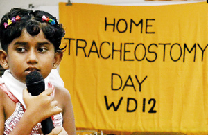 A child sings at the eighth Home Tracheostomy Care Day. Pix by Hasitha Kulasekera
