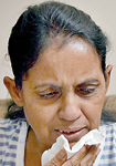 Lilani: Tears for a dead husband.  Pic by M.A. Hasitha Kulasekera