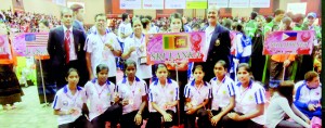 The Sri Lanka women’s team - Bronze Medal winners at the 28th King’s Cup World Sepak Takraw Championships. Standing (L to R) T. Zahiran Hajireen (ISTAF Referee and Coach), G. Jayatissa (Asst. Coach), Mrs. S.N. Zara (Lady Chaperone), a Thai Hostess, Nizam Hajireen (Vice President ISTAF). Squatting (L to R): Anusha Sandamali (Capt), Tharushi Herath, Sashini Samarasinghe, Kelani Palpita, Ishara Madumali, Haruni Rusmilla and Wansala Maduwanthi.