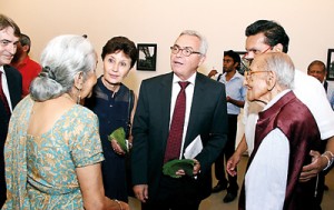 French Ambassador in Sri Lanka Jean-Paul Monchau and Madame Monchau walk around the exhibition.