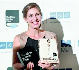 New Zealand writer Eleanor Catton, winner of the Man Booker Prize 2013, poses for photographs at the Guildhall in central London (Reuters)