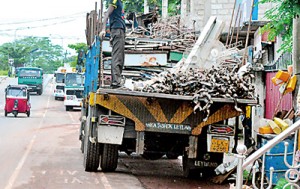 Lorries unloading goods blocking both motorists and pedestrians