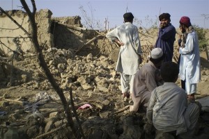 Tribesmen gather at a site of a missile attack on the outskirts of Miranshah, near the Afghan border. Reuters file pic