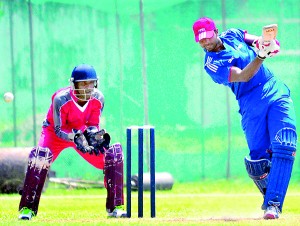 HNB batsman Kosala Kulasekara drives during his knock of 58 against Seylan Bank - Pic by Mangala Weerasekara