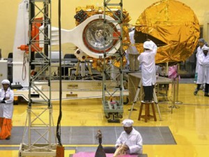 Scientists and engineers work on a Mars Orbiter vehicle at the Indian Space Research Organisation's (ISRO) satellite centre in Bangalore (AFP)