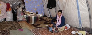 No consensus on R2P at UN Security Council: A Syrian woman sits with her children in a tent in a refugee camp in Istanbul. Reuters