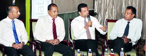 The three speakers with  STBC  president Chaturanga Perera