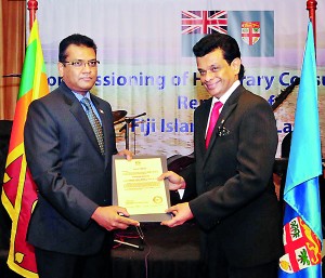 Picture  shows Parakrama Dissanayake, receiving the  appointment from Yogesh J. Karan.