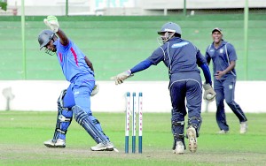 HNB batsman Ranil Dhammika is brilliantly stumped by John Keells wicket keeper Denuwan Rajakaruna 					- Pic by Amila Gamage