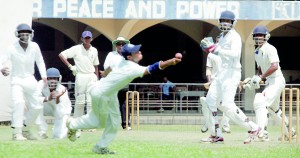 A St. Joseph’s fielder narrowly misses an early opportunity to get hold of a catch of Chathuranga Rajapakse, who top scored for Maris Stella in their first inning. - Pix by Amila Gamage