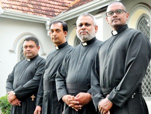 Priestly line-up: Fr. Malinda de Mel, Fr. Upul Fernando, Fr. Keerthisiri Fernando and Fr. Suranga de Mel. Pix by Mangala Weerasekera