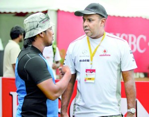 SLRFU President Asanga Seneviratne in a deep discussion with Sri Lanka Sevens coach Nilfer Ibrahim during the Asian Sevens Series in Mumbai. - Pic SLRFU