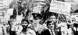 Resistance to Apartheid is largely based in the nonviolent teachings of Mahatma Gandhi. A policeman arrests two Indian men of South Africa, on November 14, 1983 during a demonstration against Apartheid outside Durban city Hall (AFP)