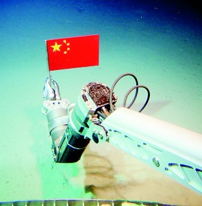 A Chinese submersible places the national flag on the seafloor in the South China Sea. Pic courtesy chinesedefence.com