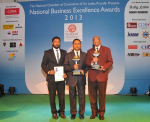 Picture shows Gemunu Goonawardena, Vice President - Resource Planning and Development / F&B, Aitken Spence Hotels (R) , Tilak Gunawardana, Vice President - Finance, Aitken Spence Hotels ( C) and Lakshitha Bandara, Financial Accountant, Aitken Spence Hotels (L)  along with the awards received at the ceremony.