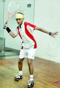 Navin Samarasinghe steadies himself for a rasping forehand. - Pic by Ranjith Perera