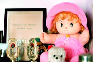 School trophies and dolls belonging to a 23-year-old woman who was gang raped on a bus on December 16, seen on a table inside her parent's bedroom in New Delhi (REUTERS)