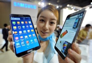 A model holds Samsung's first 'curved' smartphone Galaxy Round (AFP)