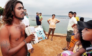 See what we can do: A cliff-jumper shows their album of photographs