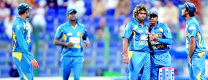 Angelo Mathews (2nd from left) rushes to join his celebrating team mates in the fifth ODI against Pakistan. - AFP