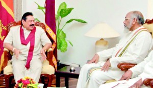 Building up a working relationship: Rajapaksa and C.V. Wigneswaran exchanging views soon after the latter took oaths as the Chief Minister of the Northern Province.