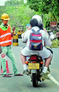 In the face of a chronic shortage of affordable public transport, parents are forced to ignore road rules