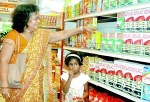 Champa de Silva: A search for full cream milk powder led her a few packets of Maliban milk at the Sathosa.  Pix by Indika Handuwela and Athula Devapriya