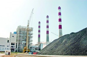 Coal is piled up near the Lakvijaya power station, waiting to be crushed and burned. Pix by Nilan Maligaspe